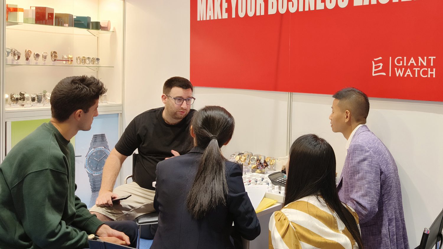 Buyers meeting Giant staff at the stand, under the red banner reading Make Your Business Easier.